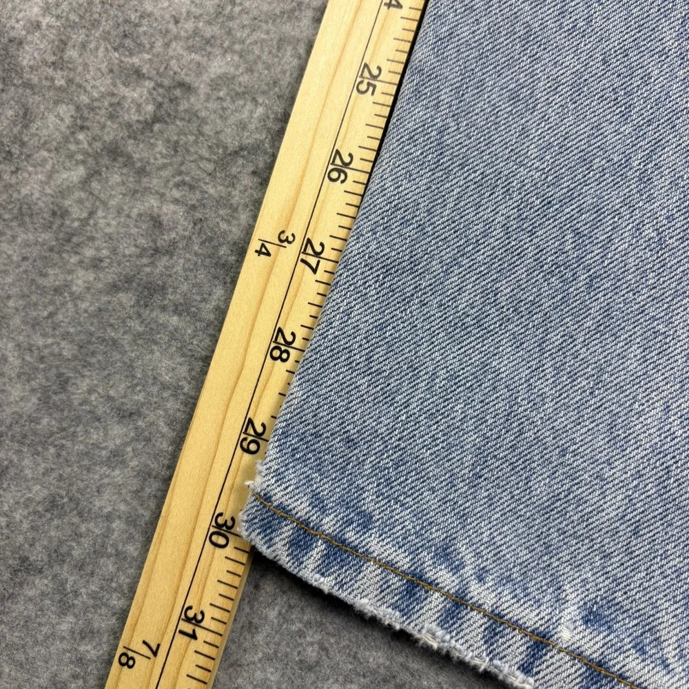 Vintage Levis 560 Loose Fit Tapered Leg Jeans Light Wash Denim 33x30 Made in USA